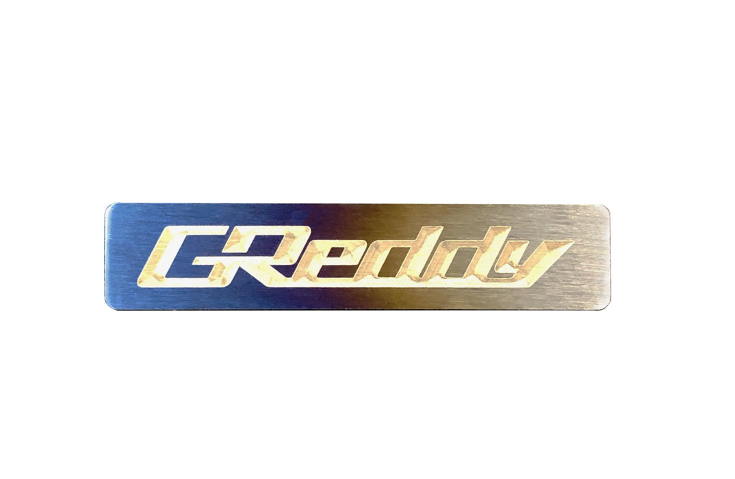GReddy Titanium Emblem (70mm X 15mm)