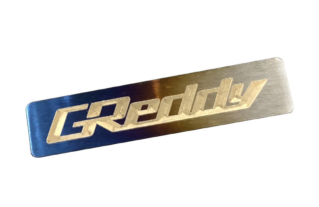 GReddy Titanium Emblem (70mm X 15mm)