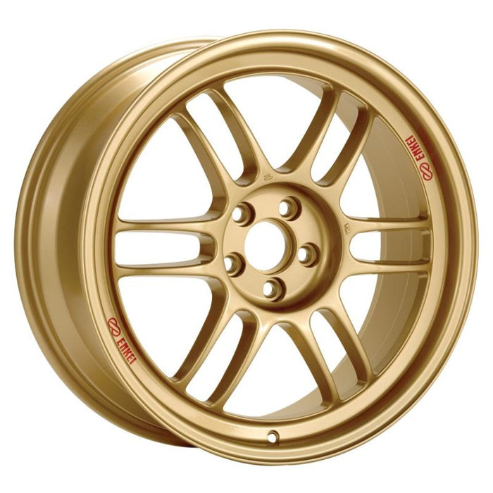 An Enkei RPF1 alloy wheel in gold finish, featuring a multi-spoke design and a brand logo in the center.