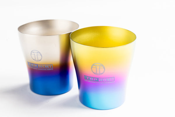 Top Secret Japan Titanium Tumblers in Silver-to-Blue and Gold-to-Blue gradient