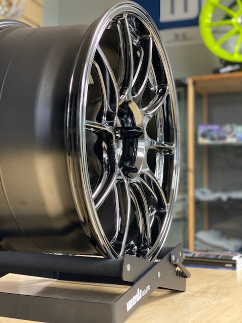 Weds TC105X wheel sitting on a table in SBC finish for civic type r