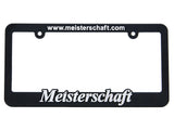 Meisterschaft license frame featuring a sleek black design with white branding and website URL.