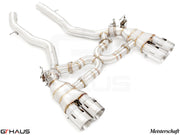 Premium performance exhaust system for BMW F80/82/83 M3/M4, featuring stainless steel construction and quad tips.