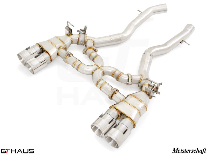 Premium performance exhaust system for BMW F80/82/83 M3/M4, featuring stainless steel construction and quad tips.