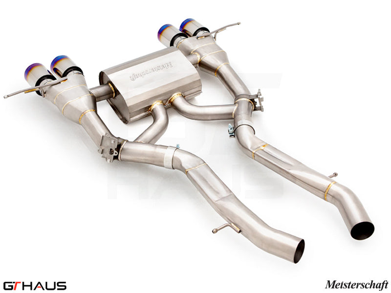 Premium Meisterschaft exhaust system for BMW G80/82/83 M3/M4, featuring stainless steel construction and quad tips.