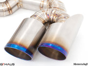 Close-up of a Meisterschaft exhaust tip featuring polished stainless steel with a blue-tinted finish, designed for Ferrari F430.