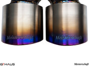 Close-up of Meisterschaft exhaust tips for Porsche 987 Boxster, showcasing a polished finish and vibrant color gradient.