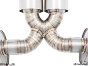 Close-up of a Meisterschaft exhaust system for Porsche 987.2 Boxster, showcasing precision welds and stainless steel construction.