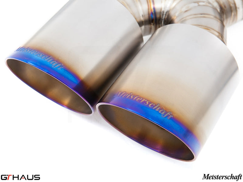 Premium Meisterschaft exhaust tips for Porsche 987.2 Cayman PDK, featuring a polished finish and vibrant blue accents.