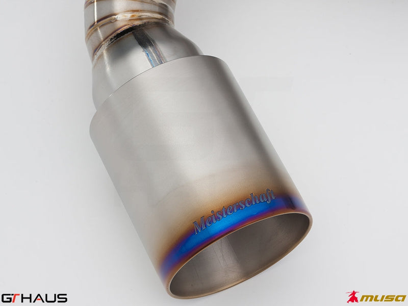 Meisterschaft exhaust tip for Nissan 370Z featuring a polished stainless steel finish and vibrant blue accents.