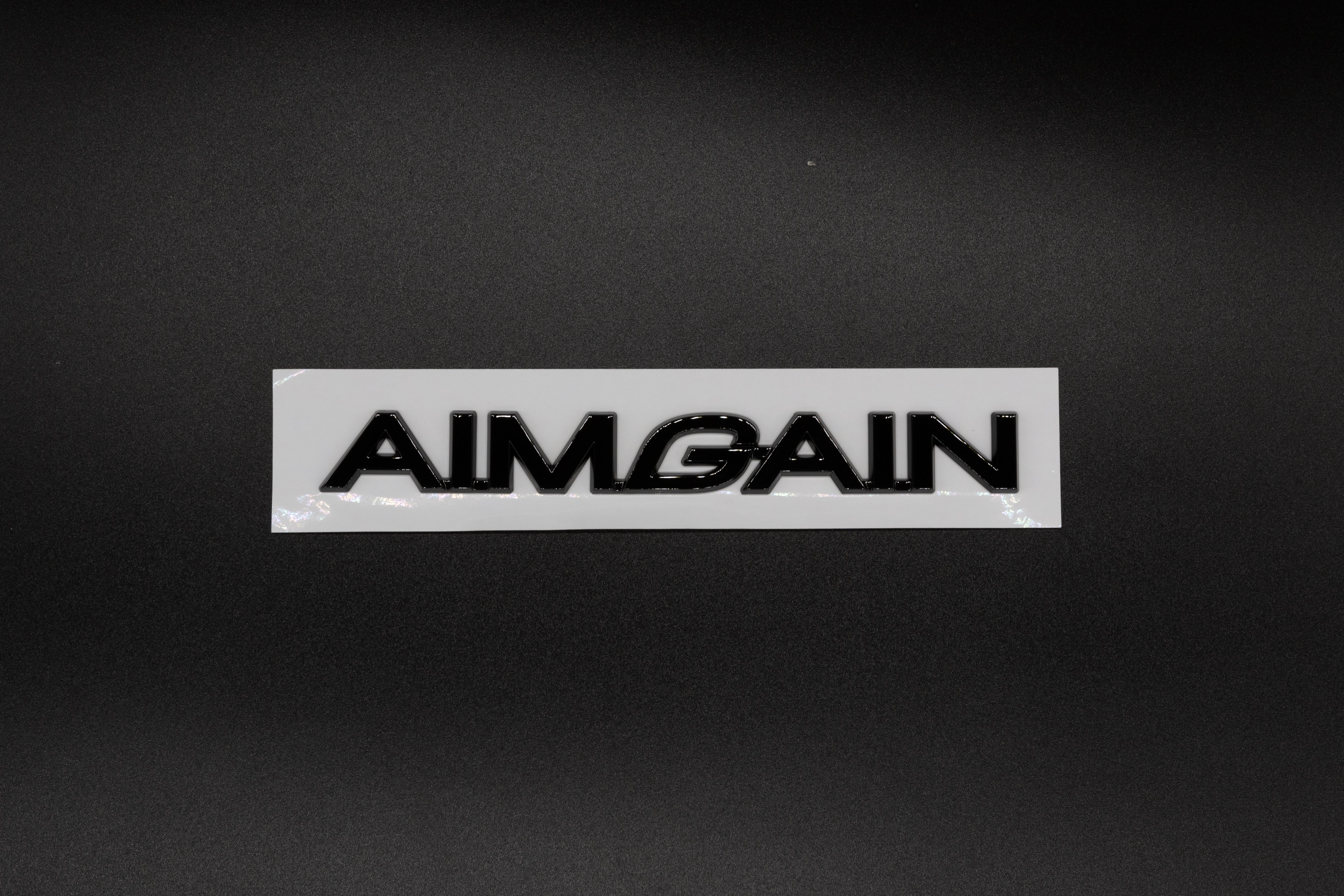 AIMGAIN Emblem – Premium JDM VIP Badge (Chrome/Gloss Black)