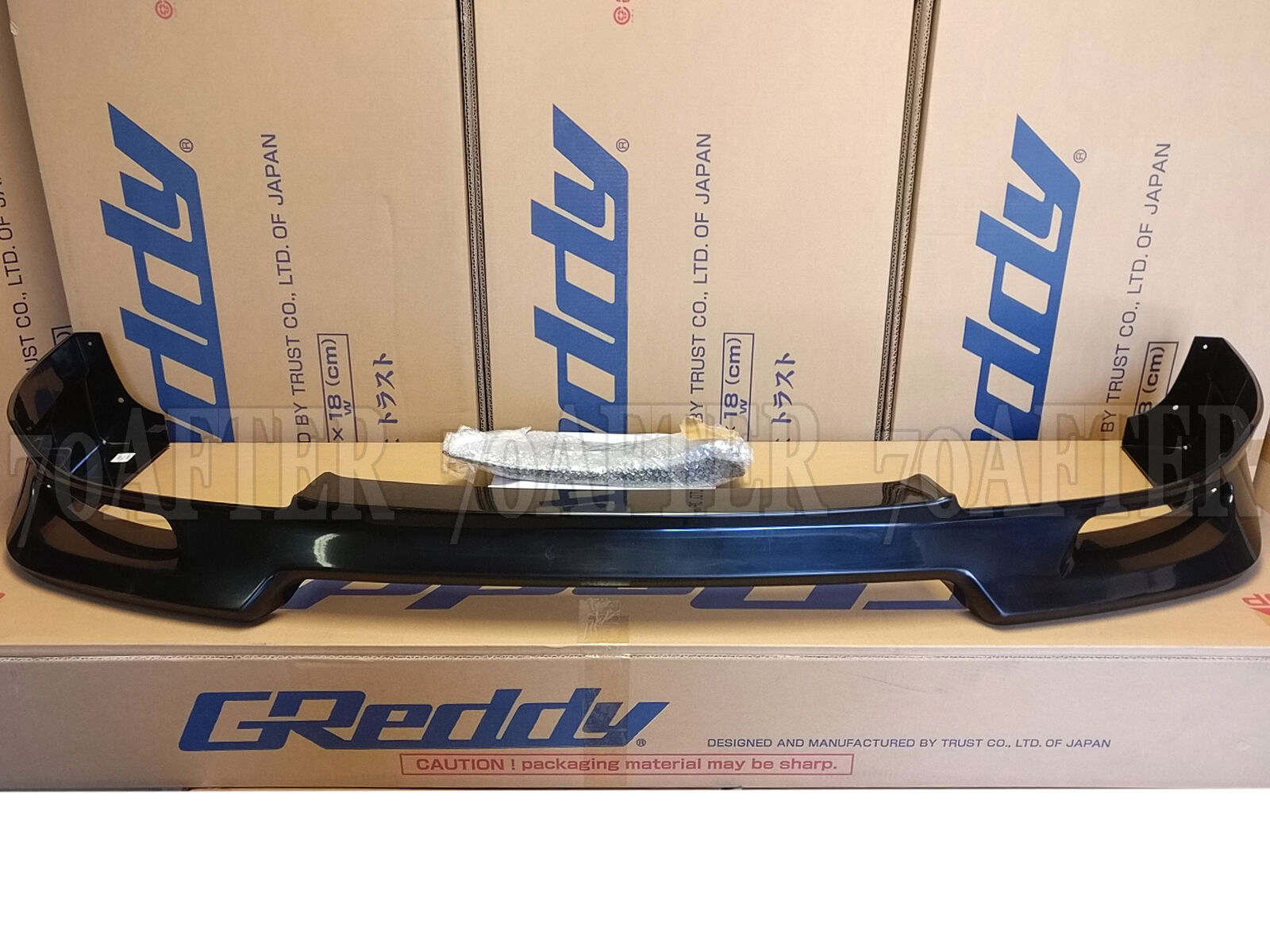 GReddy 04+ WRX & STi Fiberglass Front Lip Spoiler