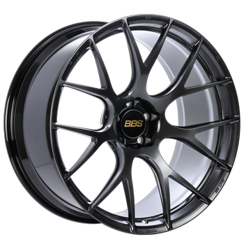 Black alloy wheel with BBS logo on a white background