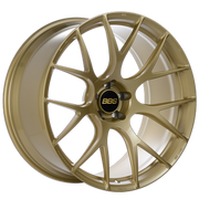 Gold alloy RE-V7 wheel with BBS logo on a white background